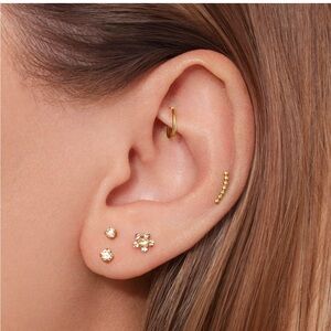 Rowan 14k gold flat back stud earring